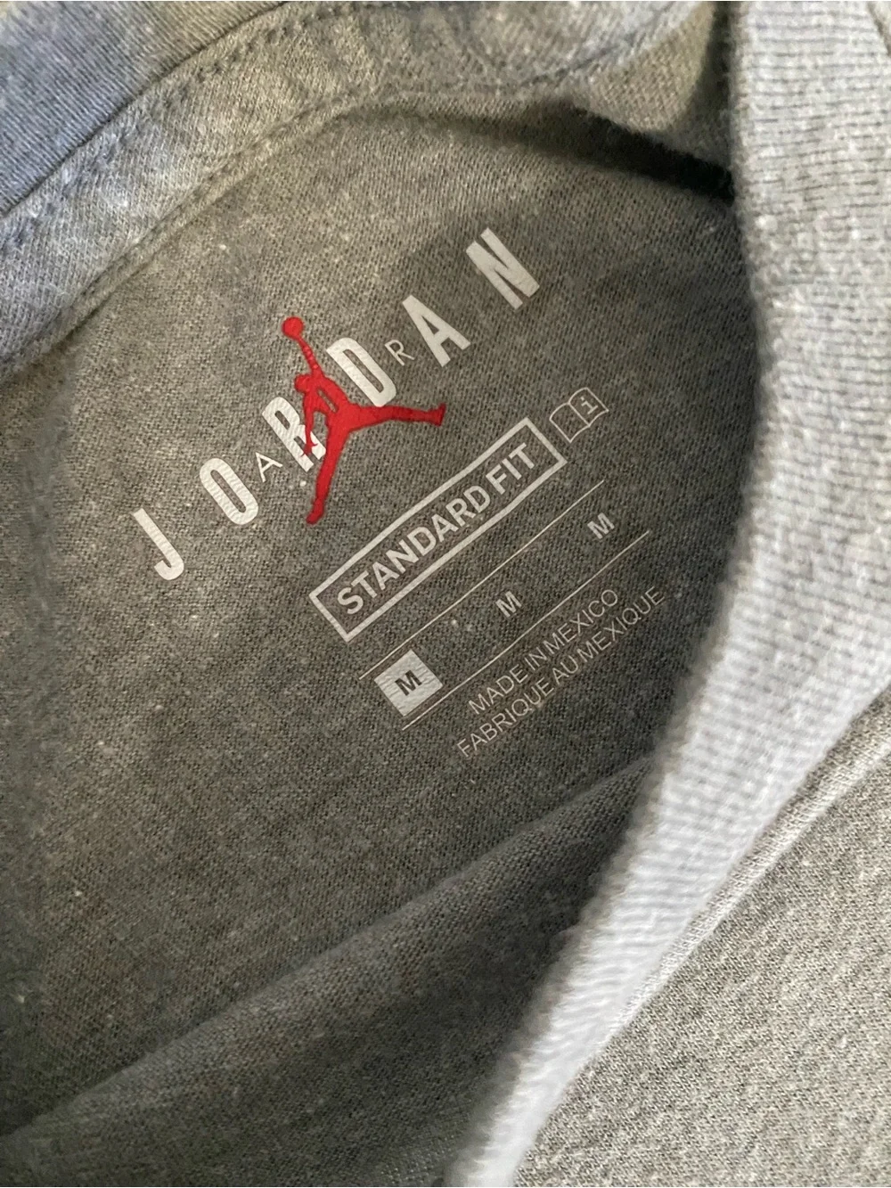 Jordan Men’s Gray Tee with Red & Black Nike Sneaker Print